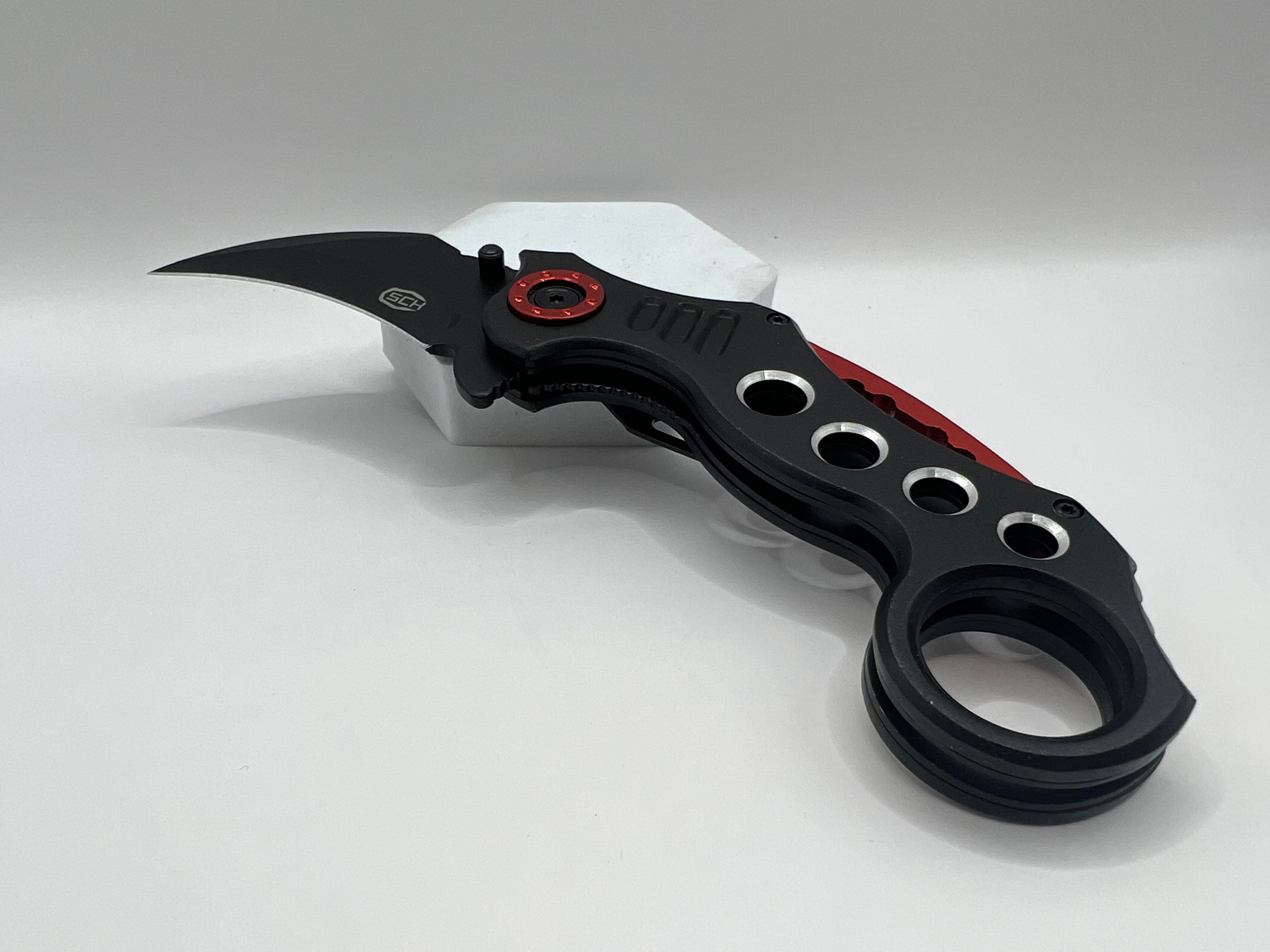 Folding carambit pocket knife-spring supported (CW-K29)