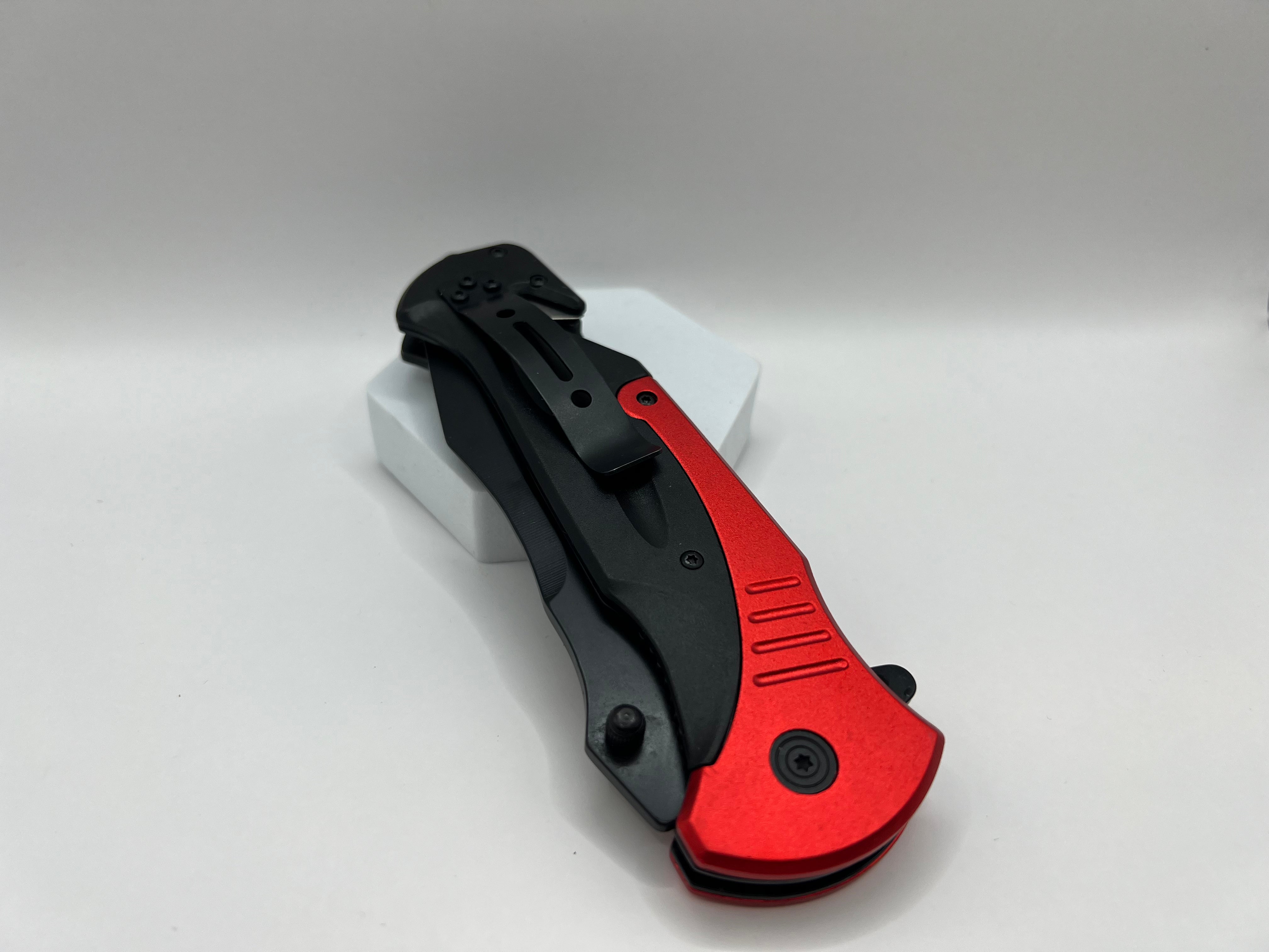 Versatile black coated pocket knife with partial wave cut